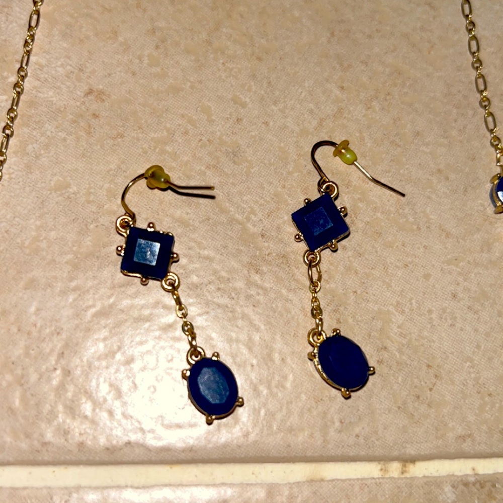 Fashion, jewelry, necklace, and earrings set. Nautical chic blue dark